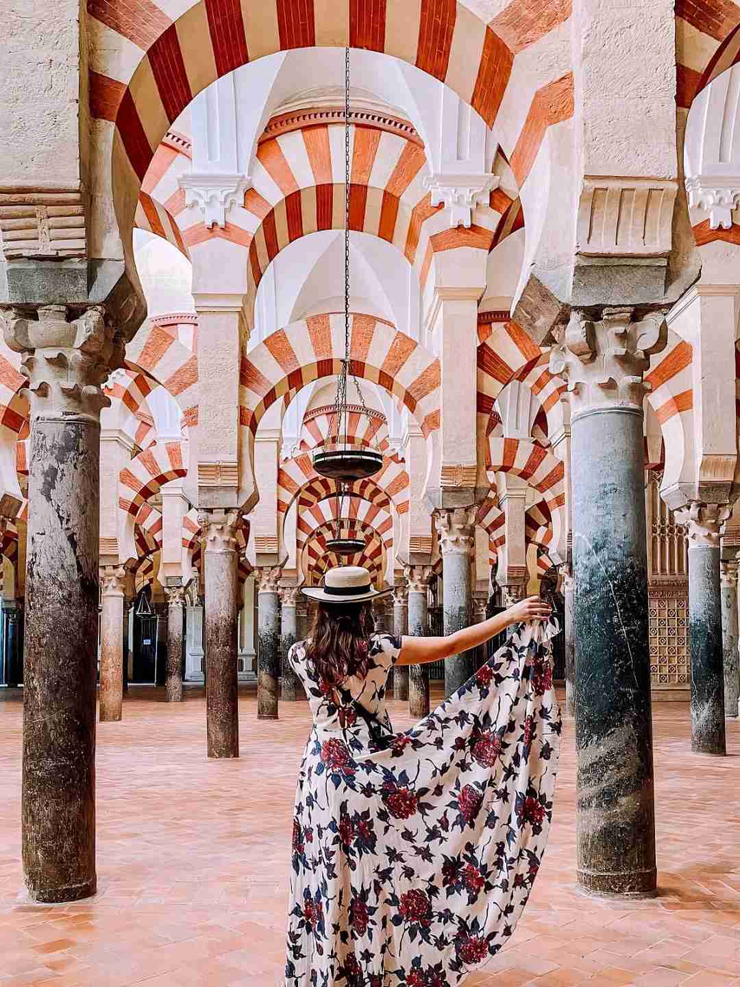 Discover the Stunning Ancient Roman Bridge and Flower Courtyard in Cordoba, Spain 🇪🇸