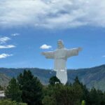 Explore Indonesia’s Lake Toba: Discover the Majestic Jesus Statue Overlooking the Scenic Waters